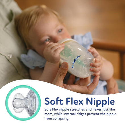A baby in blue drinks from a Dr. Talbot’s Self-Sterilizing Anti-Colic Bottle, featuring a Soft Flex Nipple with stretch, flexibility, internal ridges, and an advanced venting system. Includes Bonus Pacifier 4 Pack (9 oz).