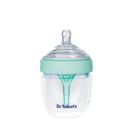 The Dr. Talbot’s Squeezy Silicone Anti-Colic Bottle (5 oz) is a clear silicone bottle with a green lid and easy latch nipple, featuring the Dr. Talbot's logo in blue on front. The empty bottle is shown on a white background.