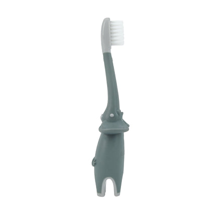 Dr. Talbot's Toddler Training Toothbrush with Toothpaste features a gray and white brush with a character-shaped handle, four legs, and a face near the head. Perfect for little hands and fluoride-free toothpaste.