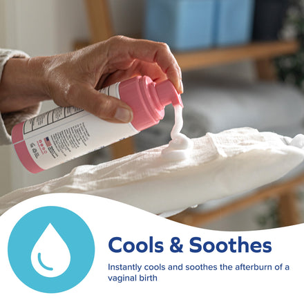 A hand sprays Dr. Talbot's Mom Perineal Soothing Foam from a pink can onto a white pad. Text below reads: Cools & Soothes—instantly relieves post-birth discomfort with witch hazel.