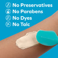 A turquoise spatula applies Dr. Talbot’s Diaper Rash Ointment | Original - 2 oz to a forearm. White text on a blue background reads: No Preservatives, No Parabens, No Dyes, No Talc, with icons for each claim.