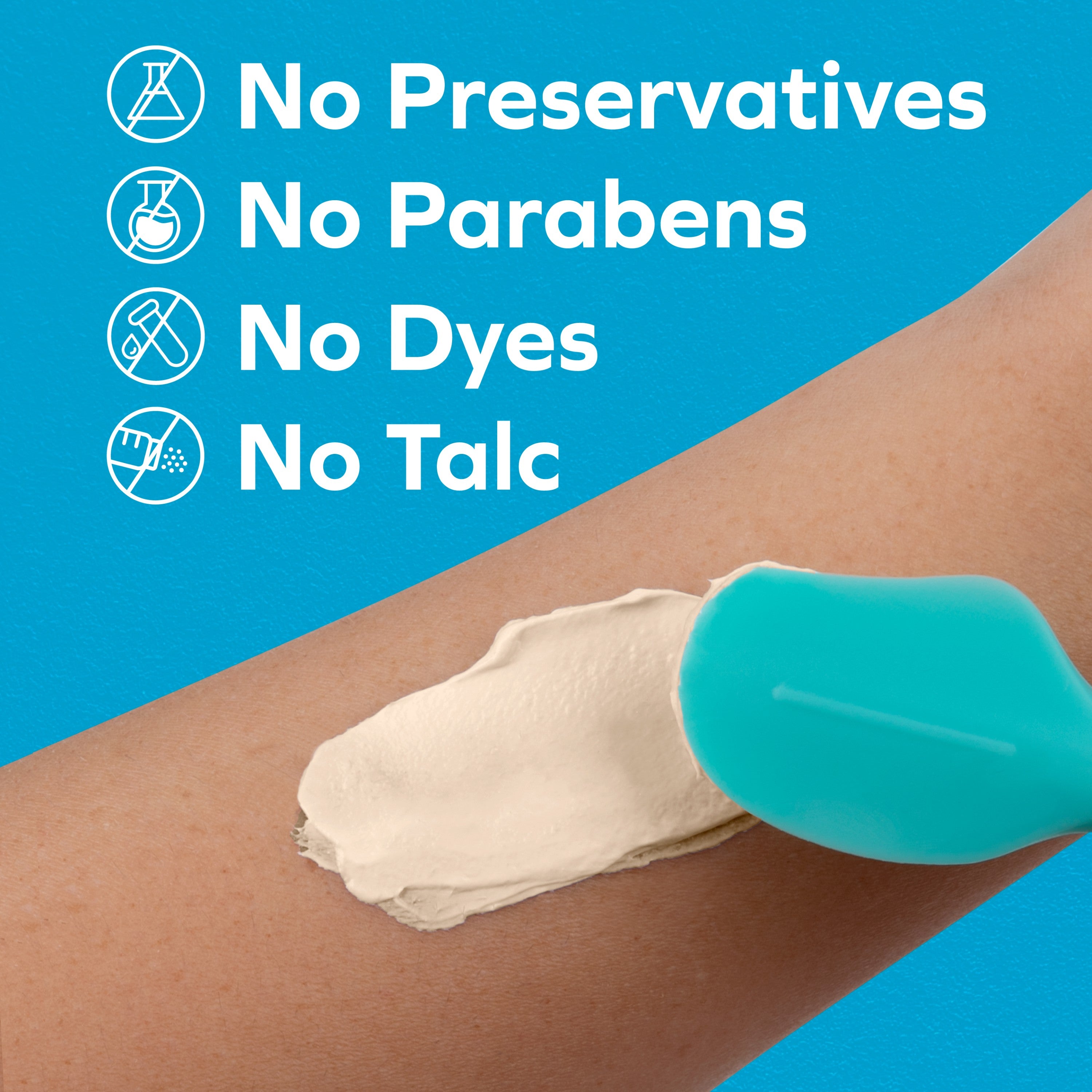 A blue spatula spreads Dr. Talbot's Diaper Rash Ointment | Original - 16 oz on a forearm. Text above reads: No Preservatives, No Parabens, No Dyes, No Talc, with symbols on a blue background.