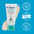 A 1 oz tube of Dr. Talbot's Diaper Rash Ointment | Original is shown on a blue background with cream smeared behind it and icons for Pediatrician Recommended, Since 1933, and 100% Vegan Formula.