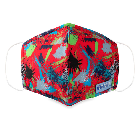 Dr. Talbot's Cloth Face Mask for ages 6-12 features a vibrant paint splatter design in red, green, blue, black, and gray. This breathable mask comes with white ear loops and a small front label. Includes 1 pack.