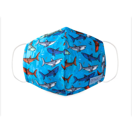 Dr. Talbot's Cloth Face Mask for ages 6-12 features a vibrant shark pattern on blue, made from breathable fabric with soft ear loops for comfort. Sold in a 1-pack.